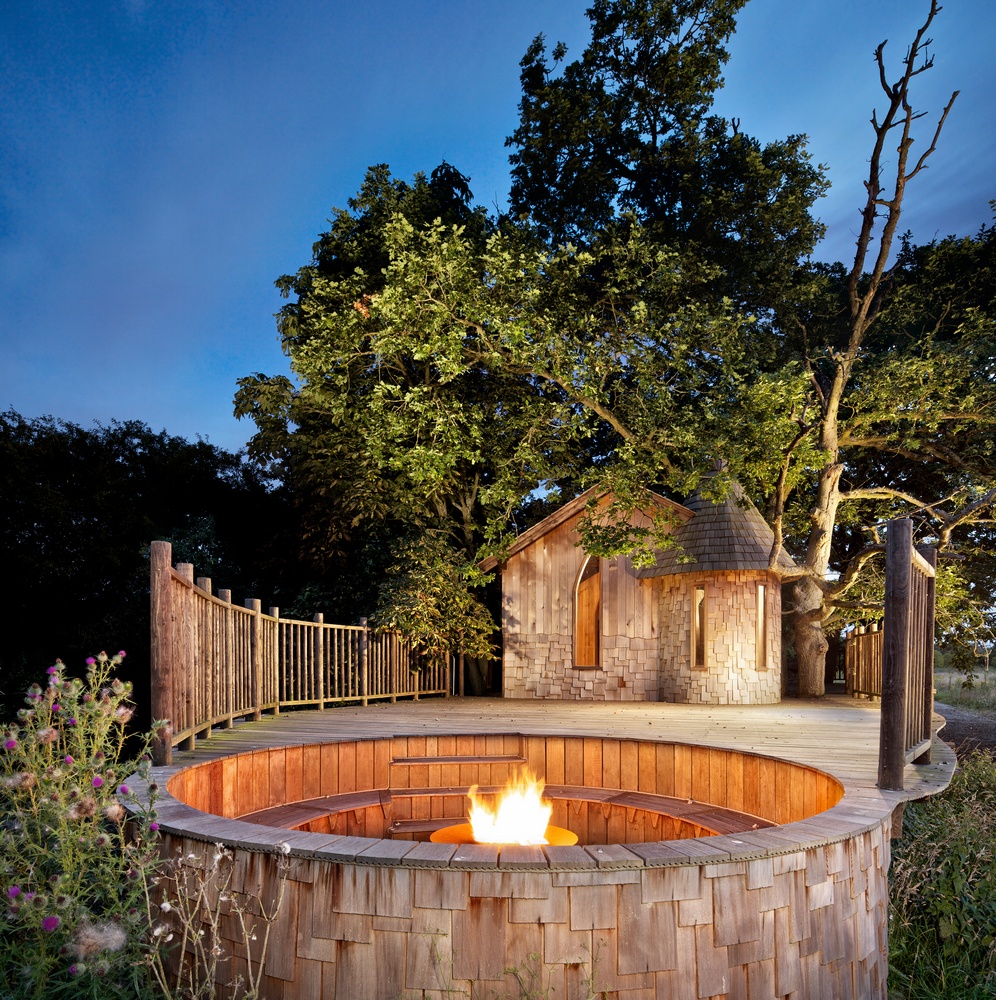 The Nook treehouse, designed and built by Blue Forest, has a firepit which makes it easy to enjoy the evening air without the British chill.